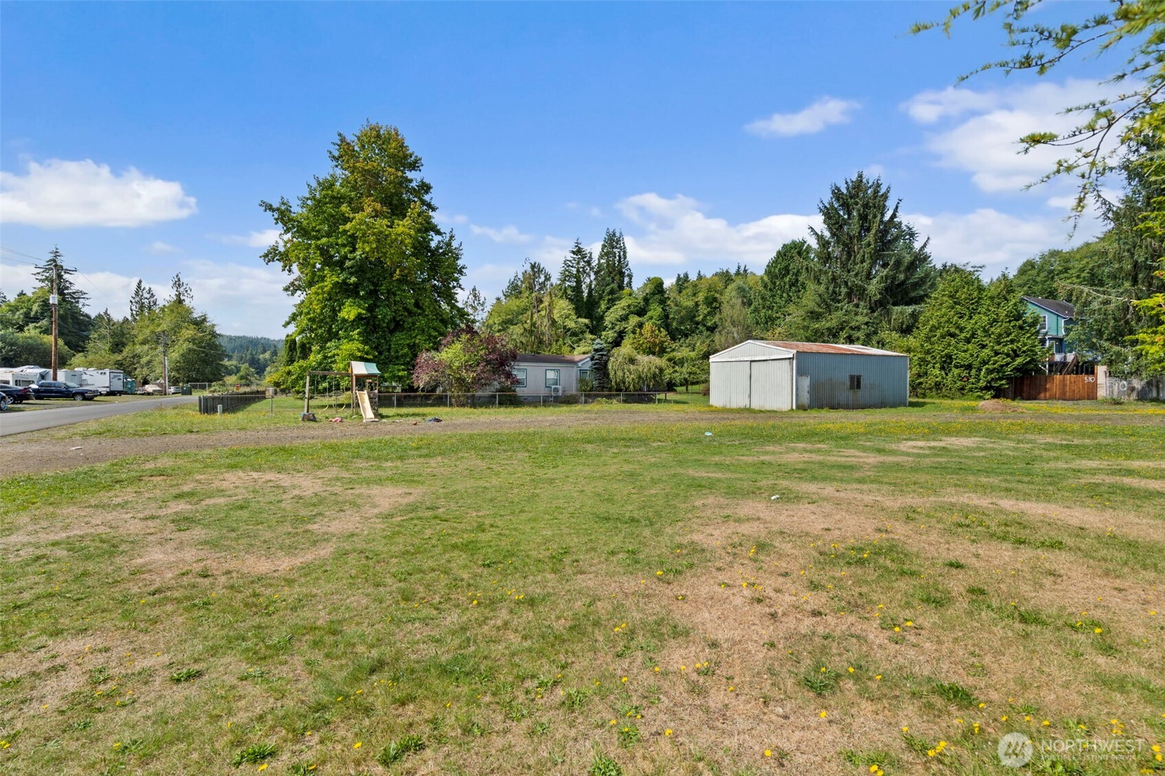 1206 West 4th Street South Bend, WA 98586 - Photo 25 of 29 a view of a trees with a big yard