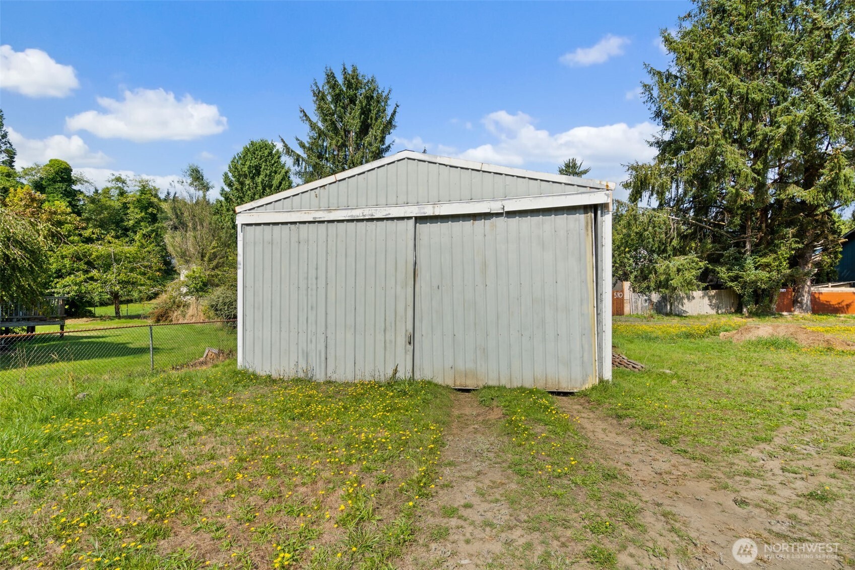 1206 West 4th Street South Bend, WA 98586 - Photo 28 of 29 a view of backyard with small garden and entertaining space