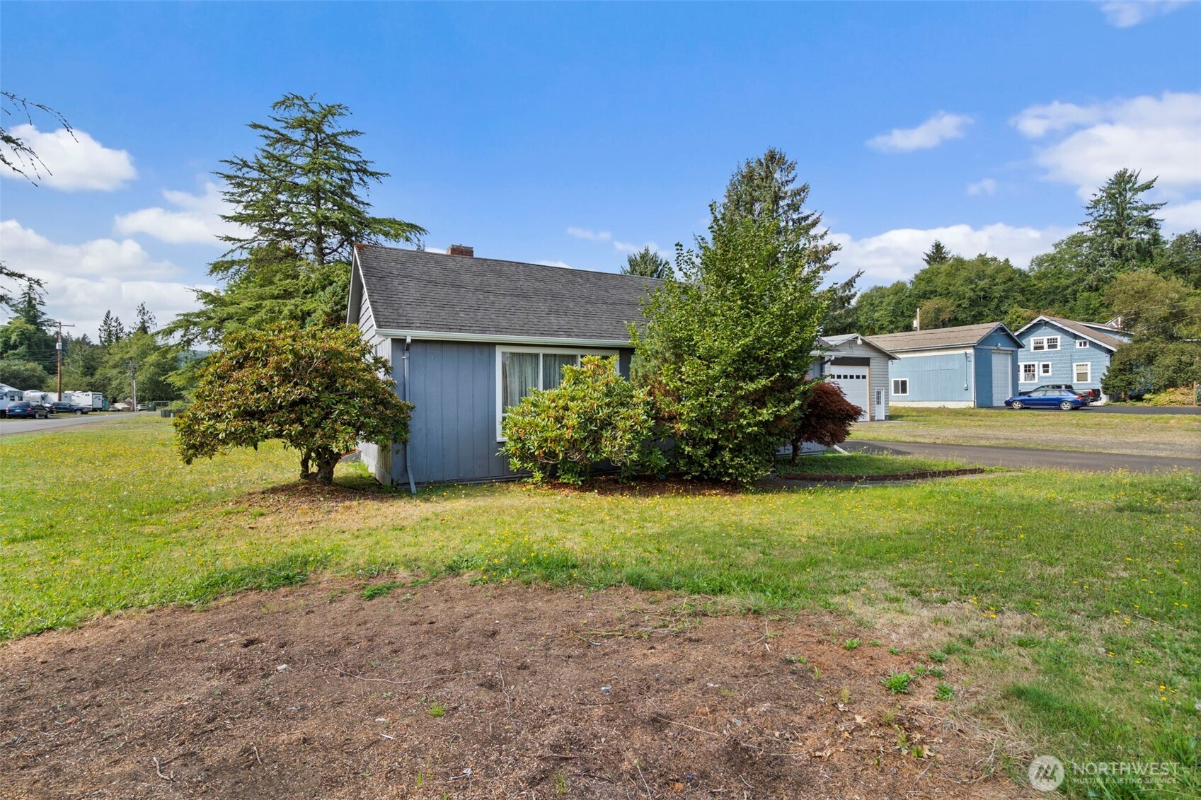 1206 West 4th Street South Bend, WA 98586 - Photo 4 of 29 a house view with a garden space