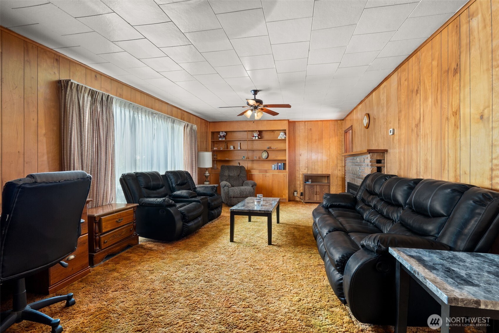 1206 West 4th Street South Bend, WA 98586 - Photo 5 of 29 a living room with furniture ceiling fan and a rug