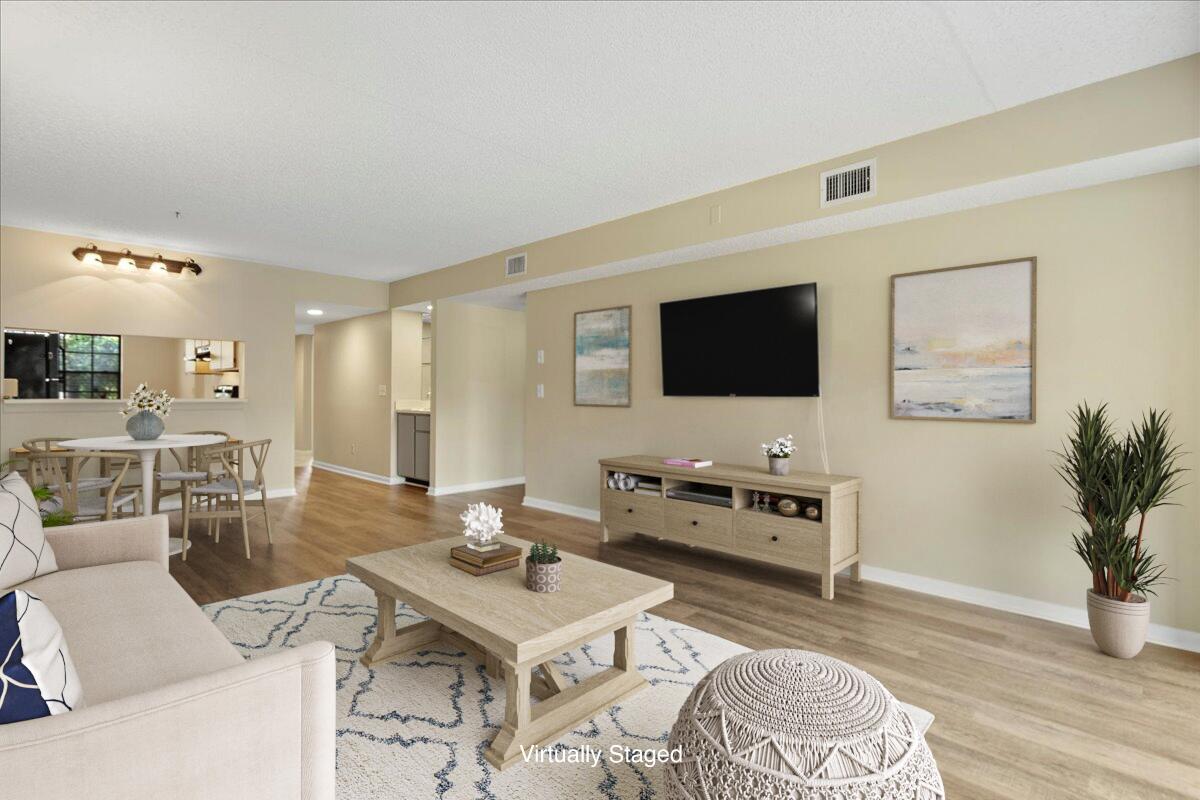 301 Pinecrest Circle, Unit C Jupiter, FL 33458 - Photo 12 of 36 Virtually Staged Living/Dining Area