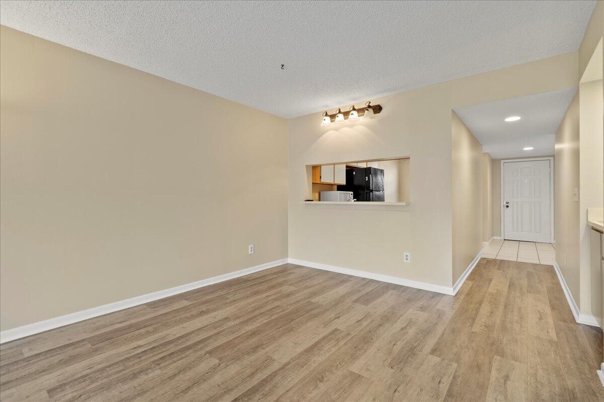 301 Pinecrest Circle, Unit C Jupiter, FL 33458 - Photo 13 of 36 Dining & Living Space