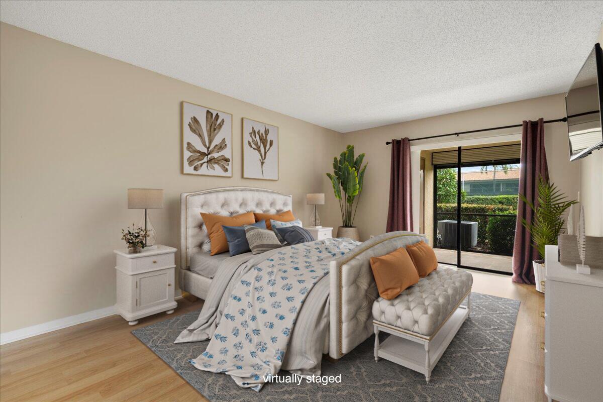 301 Pinecrest Circle, Unit C Jupiter, FL 33458 - Photo 15 of 36 Virtually Staged Master Suite