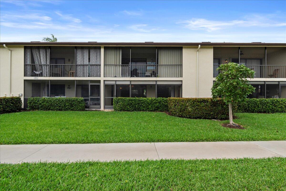 301 Pinecrest Circle, Unit C Jupiter, FL 33458 - Photo 23 of 36 Back View of Unit/Building
