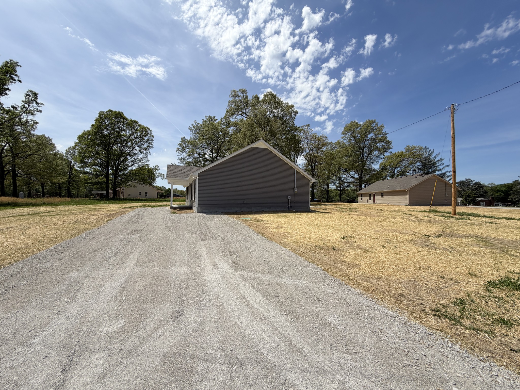 74 6 Mile Board Road Winchester, TN 37398 - Photo 16 of 99 a view of outdoor space with trees