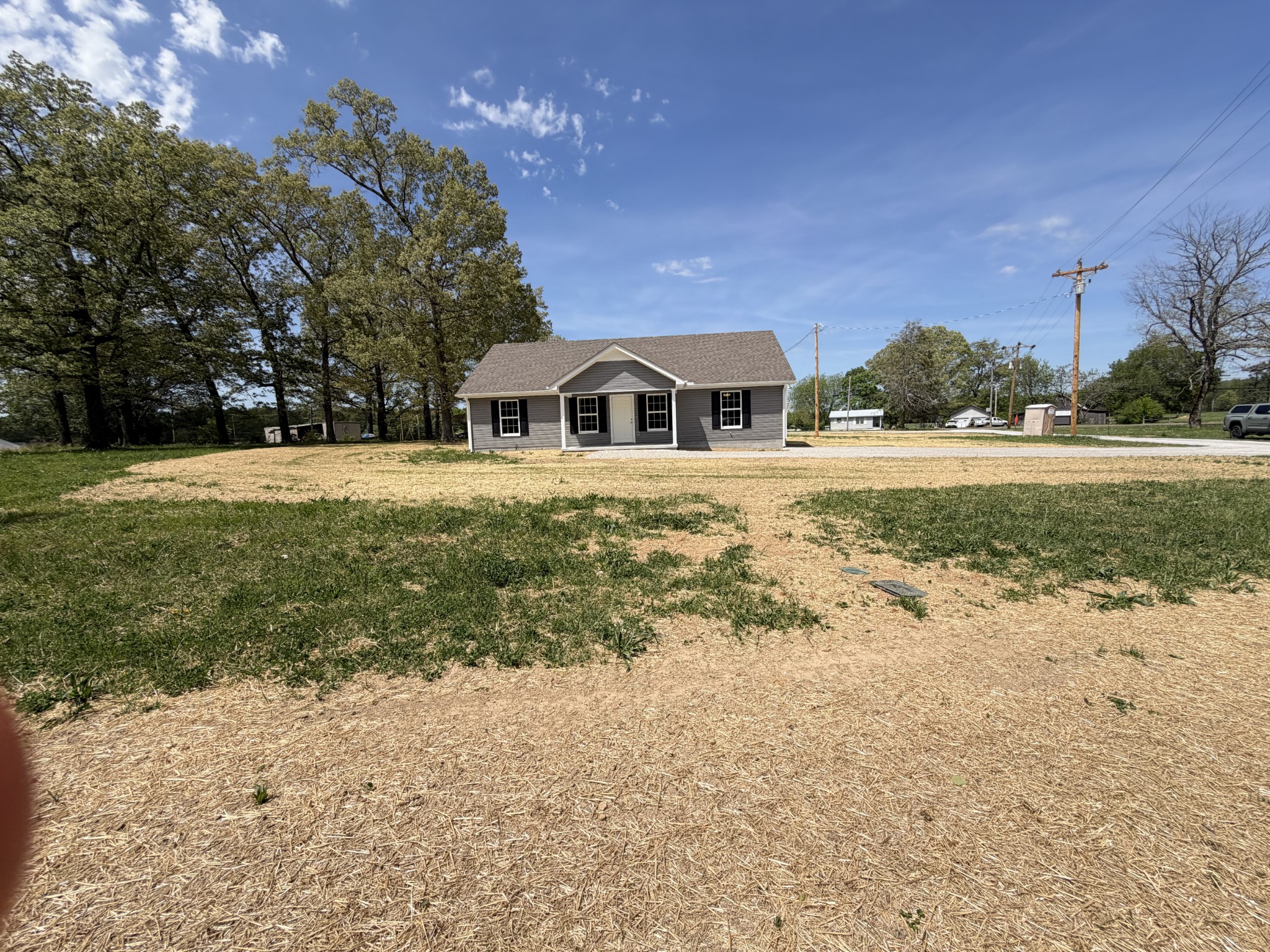74 6 Mile Board Road Winchester, TN 37398 - Photo 20 of 99 a front view of a house with a yard