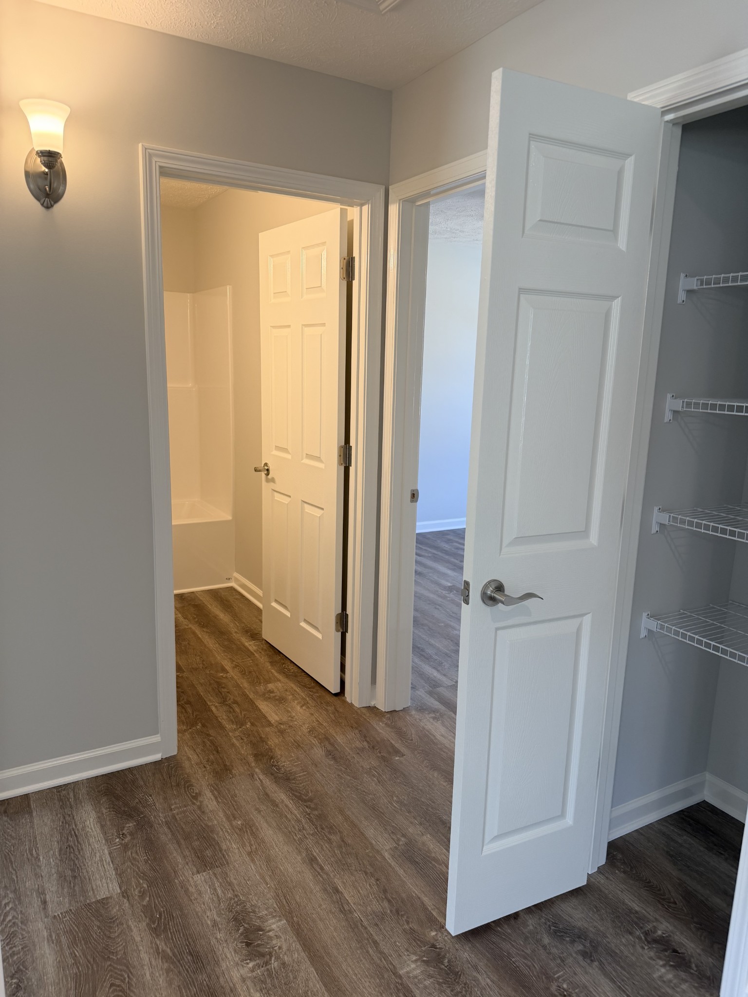 74 6 Mile Board Road Winchester, TN 37398 - Photo 49 of 99 an empty room with wooden floor and entrance