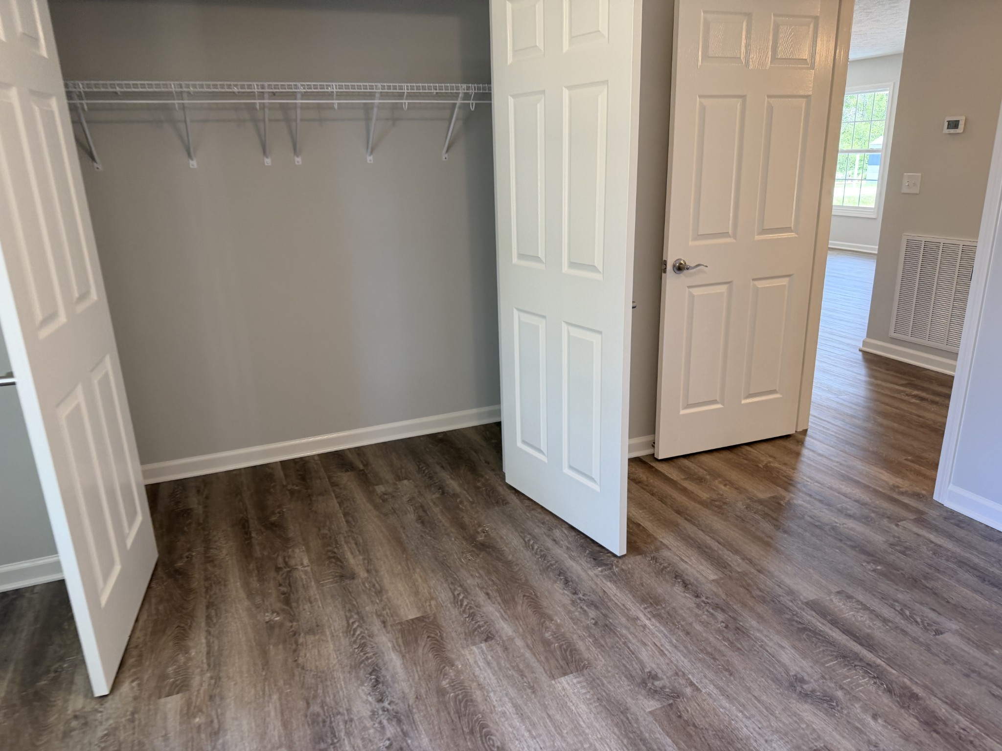 74 6 Mile Board Road Winchester, TN 37398 - Photo 54 of 99 a view of a room with wooden floor