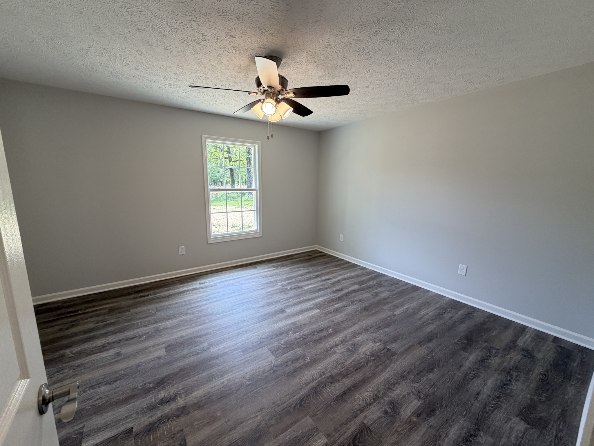 74 6 Mile Board Road Winchester, TN 37398 - Photo 60 of 99 wooden floor in an empty room with a window