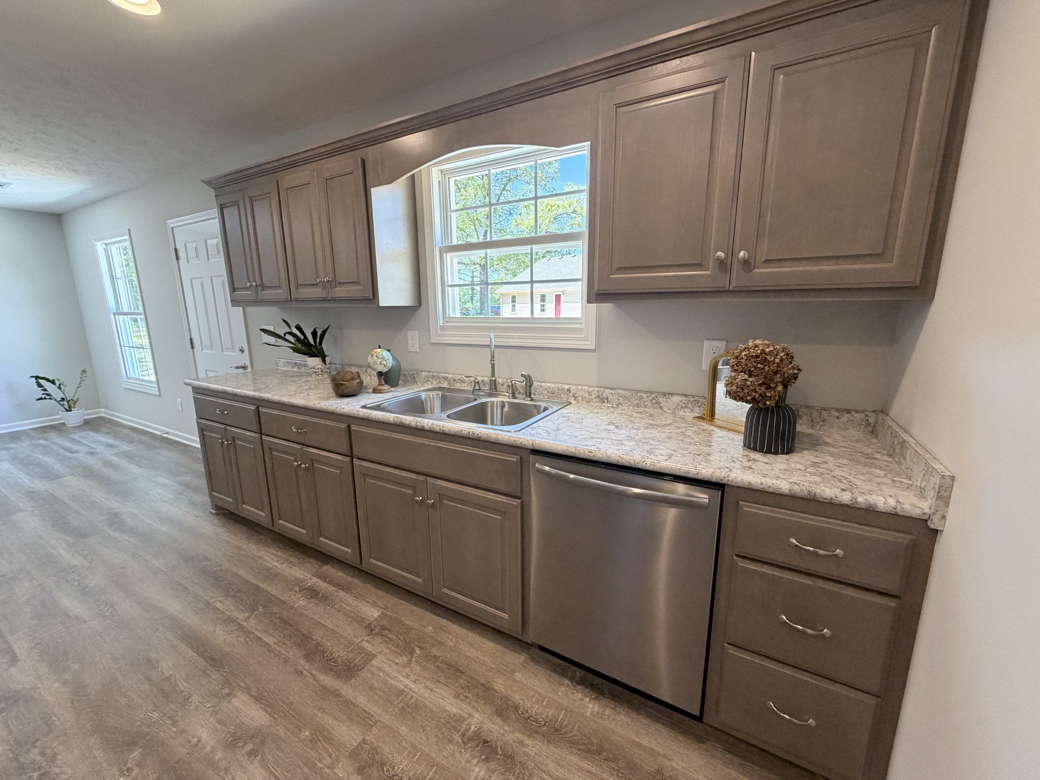 74 6 Mile Board Road Winchester, TN 37398 - Photo 89 of 99 a kitchen with stainless steel appliances granite countertop a sink a stove and cabinets
