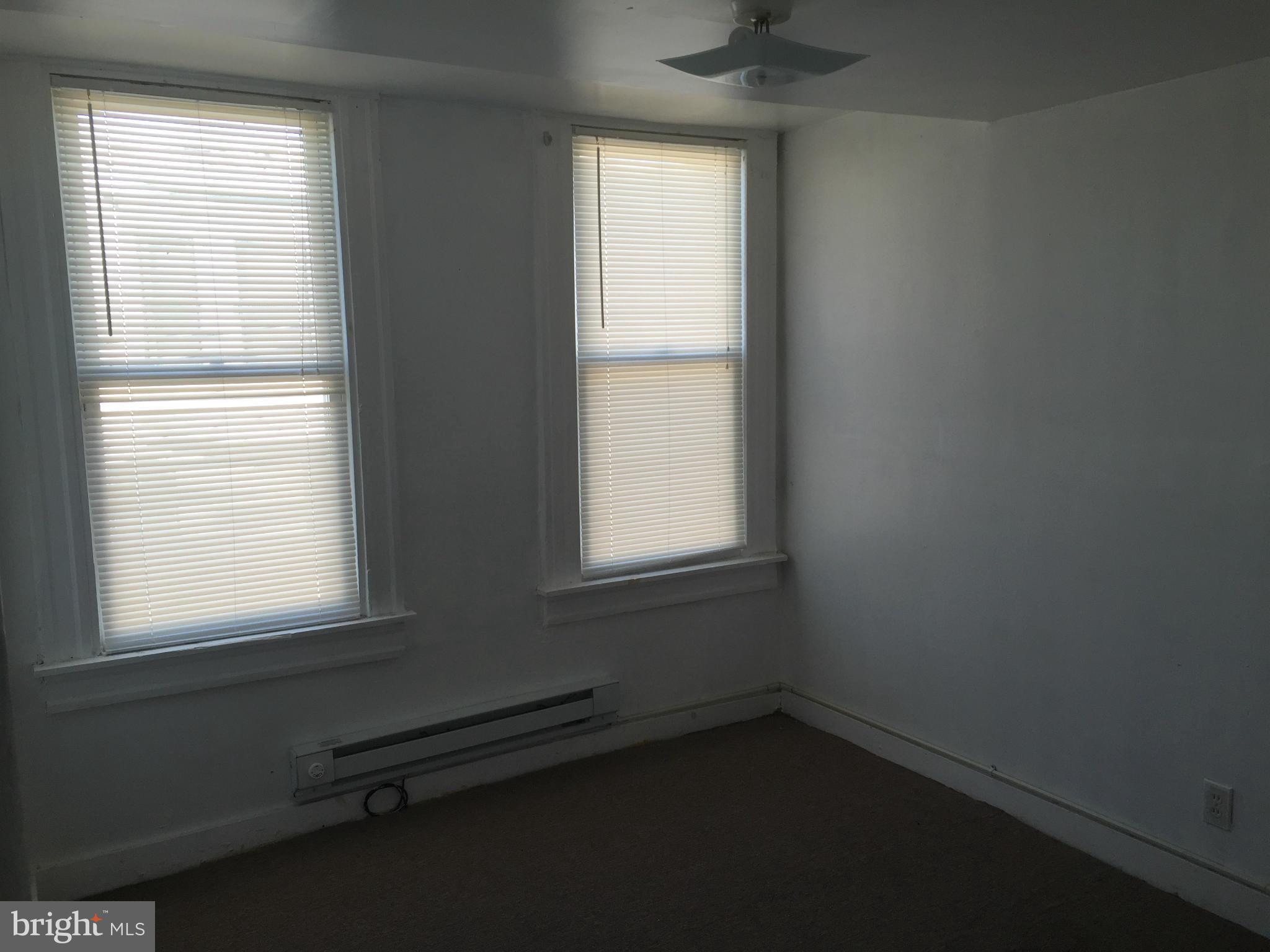 2734 Harford Road Baltimore, MD 21218 - Photo 11 of 12 an empty room with a window