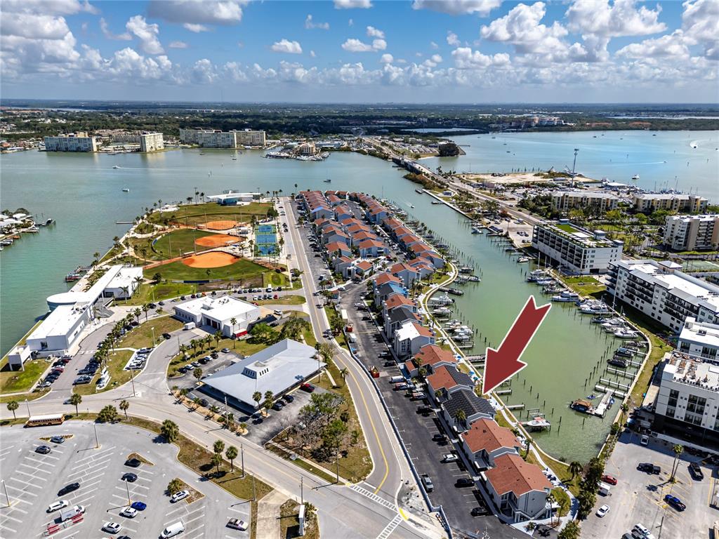 159 Medallion Boulevard, Unit H Madeira Beach, FL 33708 - Photo 56 of 57 an aerial view of a city