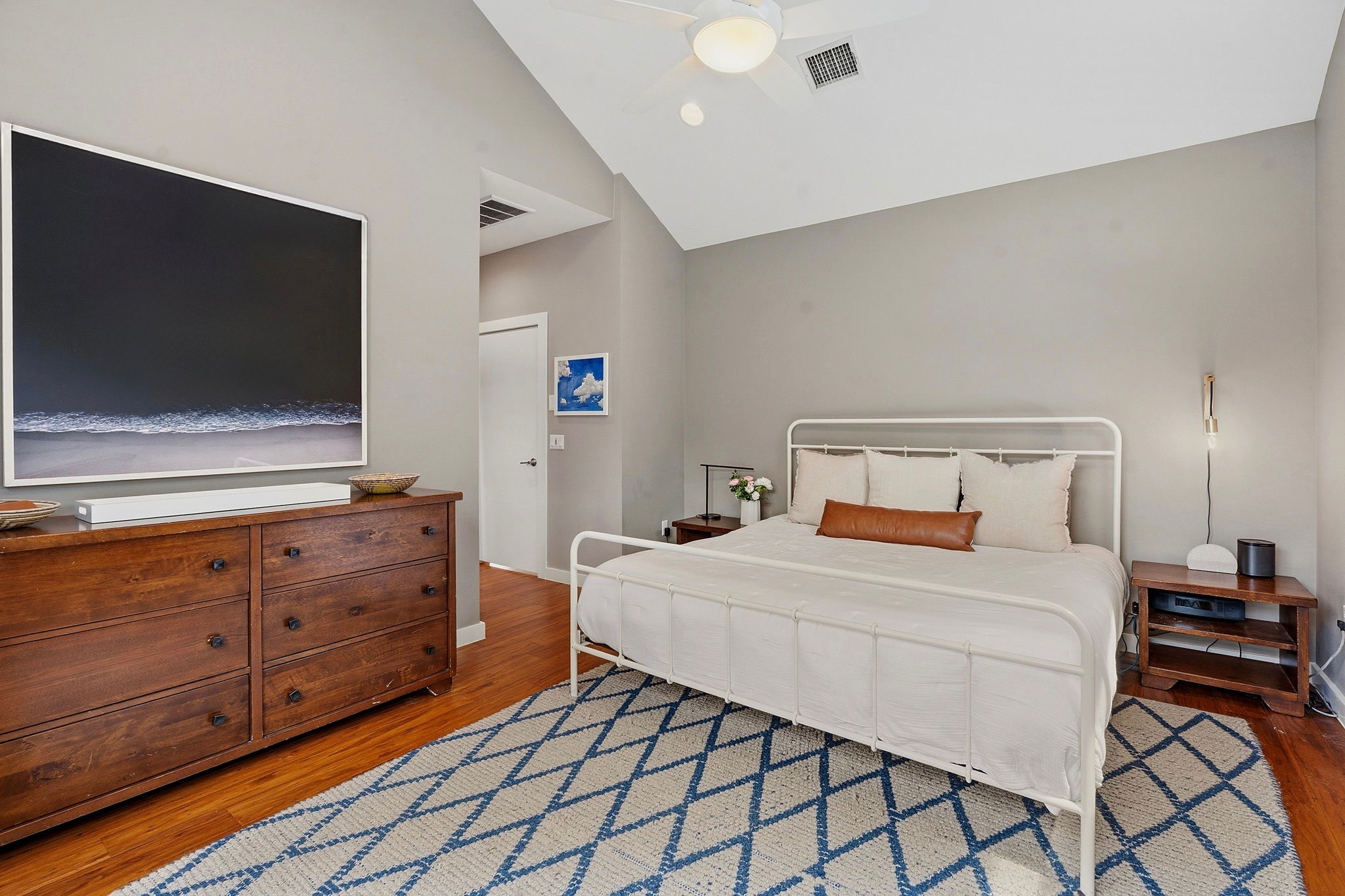 3001 Del Curto Road, Unit 31 Austin, TX 78704 - Photo 14 of 32 a bedroom with a bed and a flat screen tv
