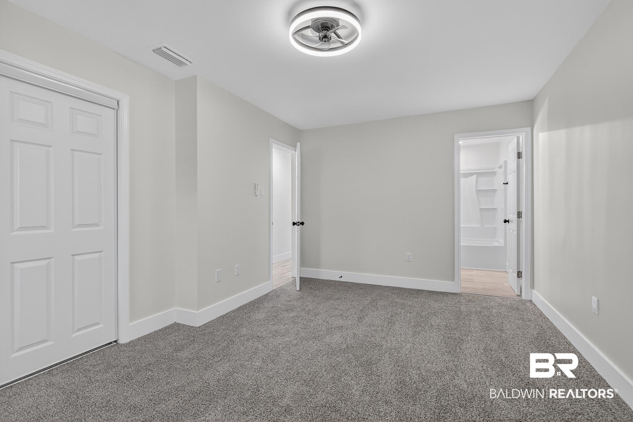 10650 Old Pascagoula Road Theodore, AL 36582 - Photo 47 of 77 Unfurnished bedroom featuring carpet flooring and connected bathroom