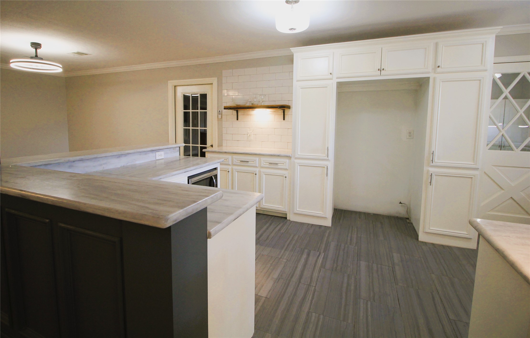 6729 Sylvan Road Houston, TX 77023 - Photo 9 of 27 Cabinet space designed to accommodate a large side-by-side refrigerator