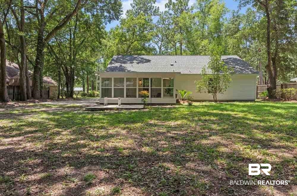 10251 Windmill Road Fairhope, AL 36532 - Photo 42 of 44 Rear view of house with a sunroom and a patio