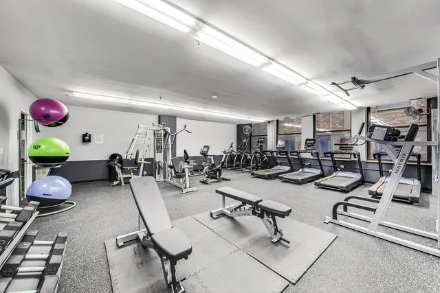 a view of a room with gym equipment