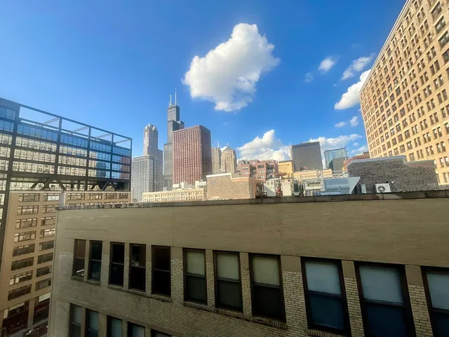 a view of a balcony with city view