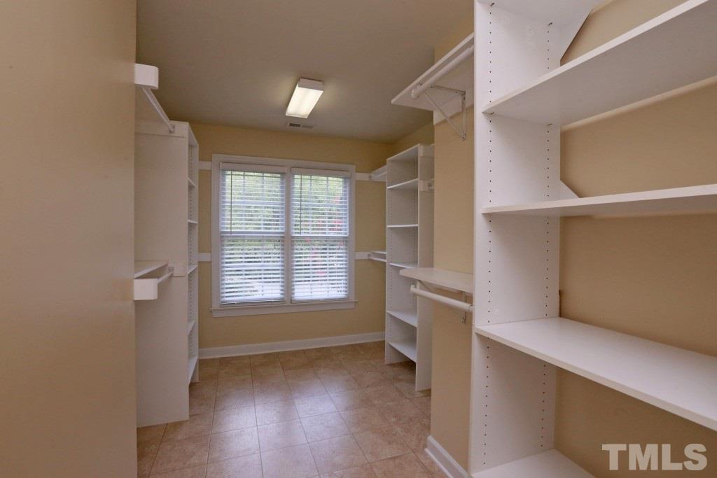 8204 Eden Close Court Raleigh, NC 27613 - Photo 16 of 25 a view of an empty room with a window