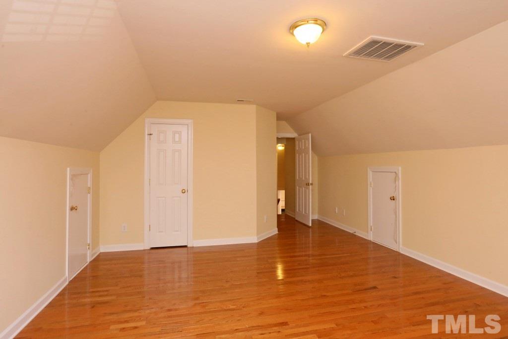 8204 Eden Close Court Raleigh, NC 27613 - Photo 17 of 25 a view of an empty room