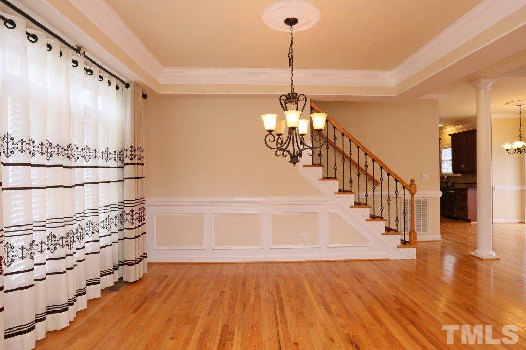 8204 Eden Close Court Raleigh, NC 27613 - Photo 3 of 25 a view of entryway and hall with wooden floor