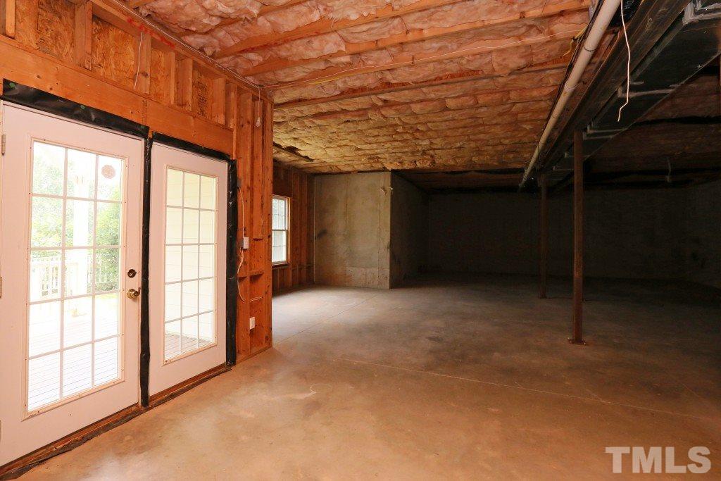 8204 Eden Close Court Raleigh, NC 27613 - Photo 22 of 25 a view of an empty room with a window
