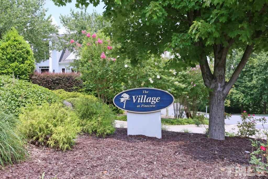 8204 Eden Close Court Raleigh, NC 27613 - Photo 25 of 25 a sign board with a house in the forest