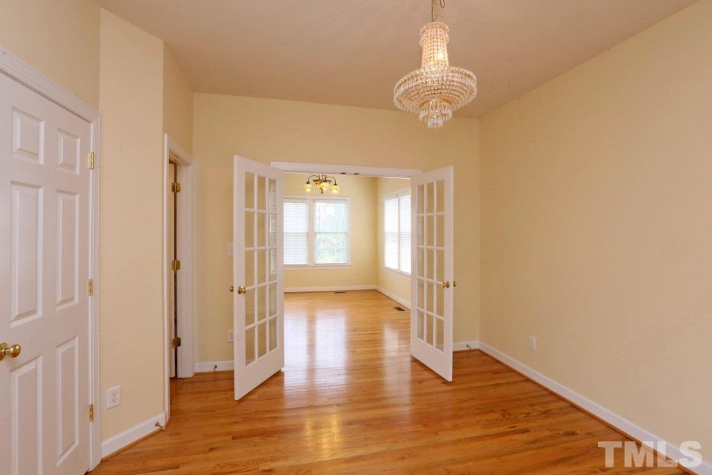 8204 Eden Close Court Raleigh, NC 27613 - Photo 10 of 25 a view of livingroom with wooden floor