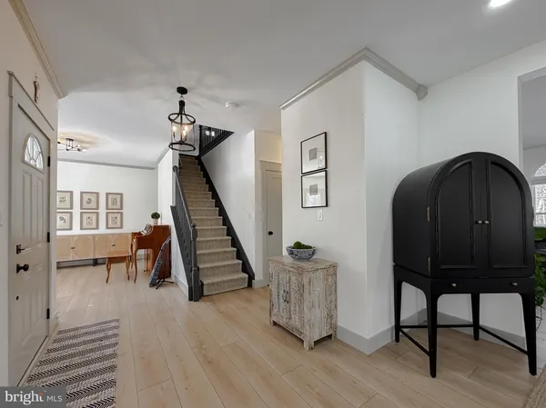 a view of a dining room with furniture and window