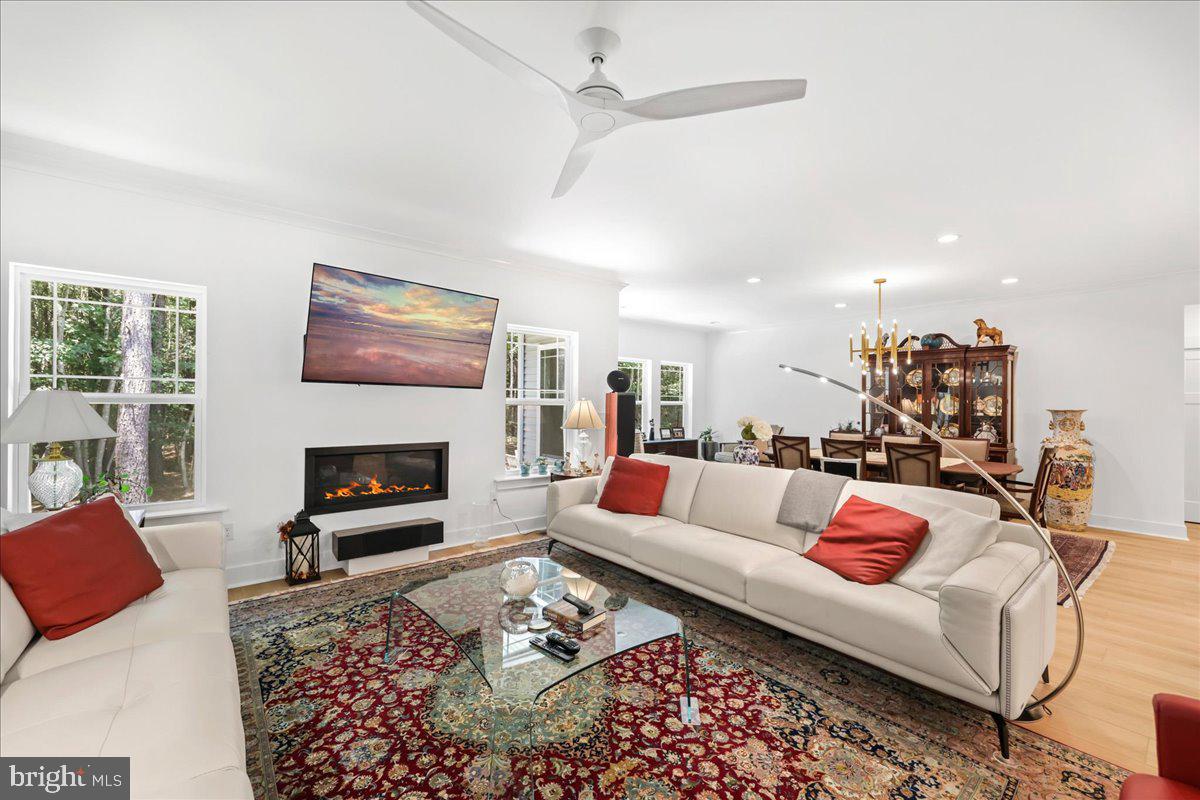 36755 Double Bridges Road Frankford, DE 19945 - Photo 13 of 38 a living room with furniture fireplace and a window