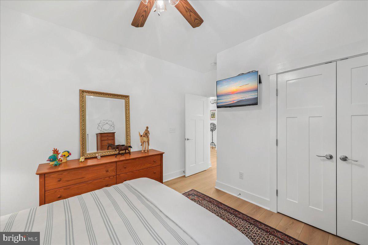 36755 Double Bridges Road Frankford, DE 19945 - Photo 25 of 38 a bedroom with a bed and a dresser