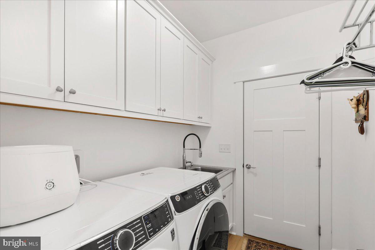 36755 Double Bridges Road Frankford, DE 19945 - Photo 30 of 38 a utility room with dryer and washer