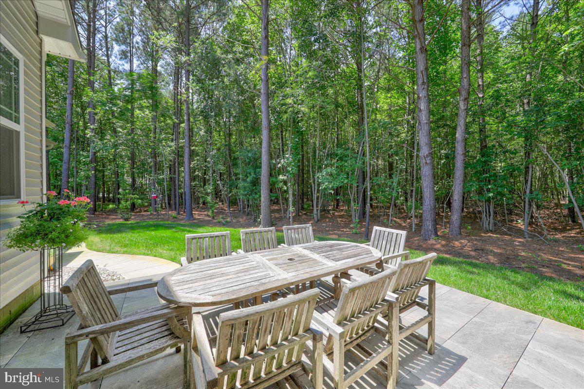36755 Double Bridges Road Frankford, DE 19945 - Photo 31 of 38 a view of outdoor dining space with a patio
