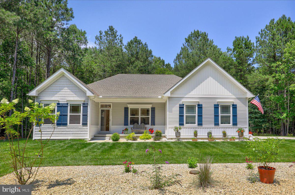 36755 Double Bridges Road Frankford, DE 19945 - Photo 34 of 38 a front view of a house with a yard