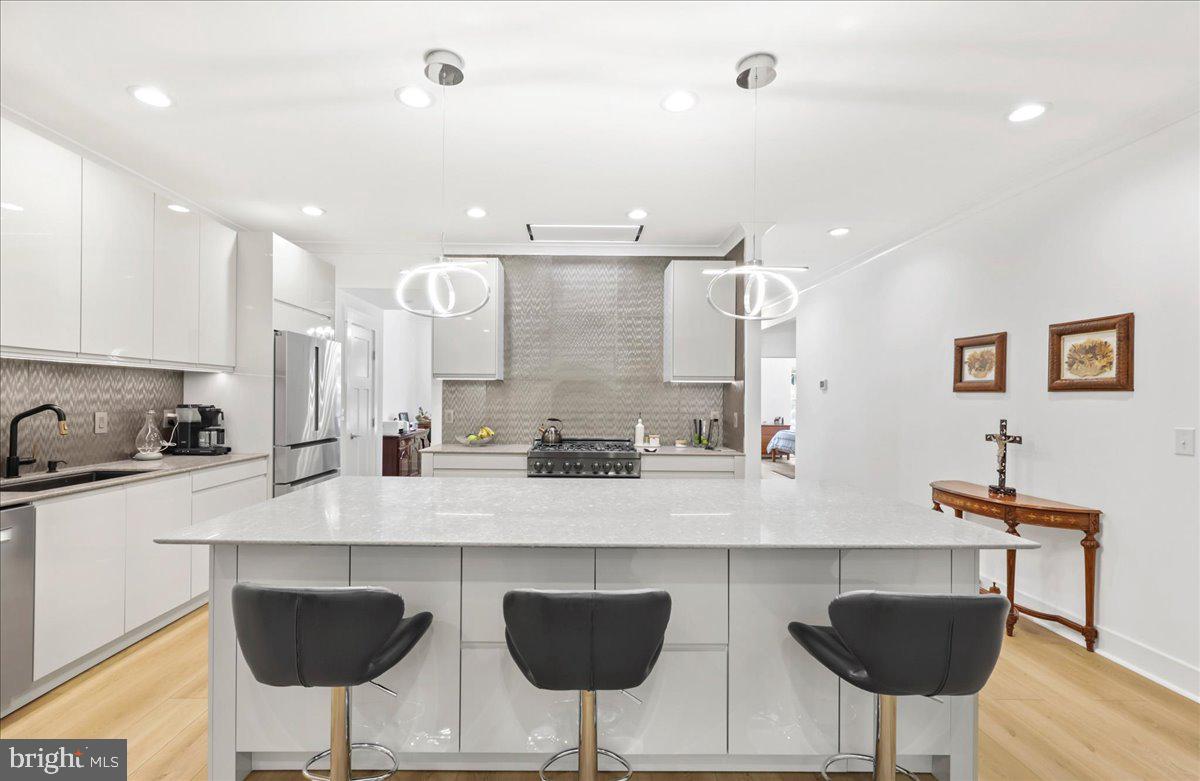 36755 Double Bridges Road Frankford, DE 19945 - Photo 8 of 38 a kitchen with stainless steel appliances granite countertop a sink and cabinets