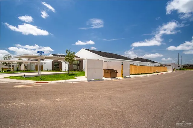 a view of a house with a big yard
