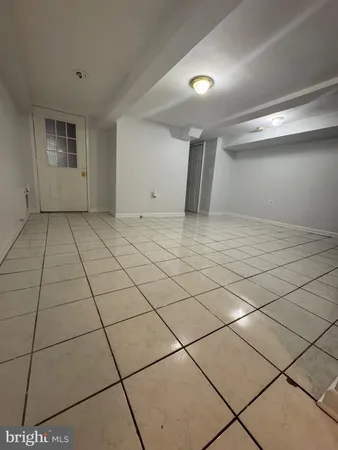 a view of a livingroom with a large window