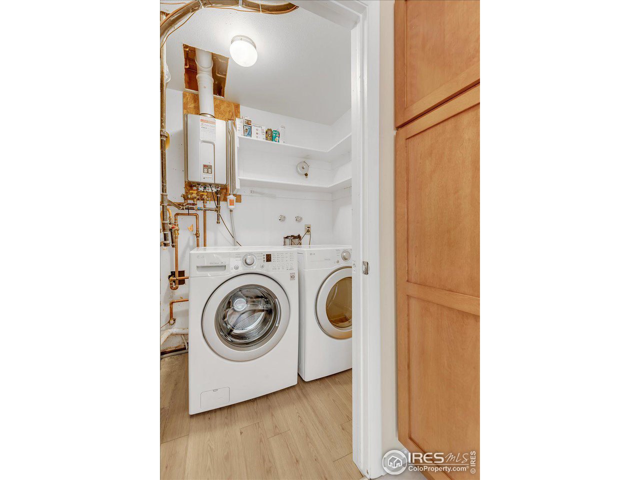 81 Benthaven Place Boulder, CO 80305 - Photo 12 of 32 a utility room with dryer and washer