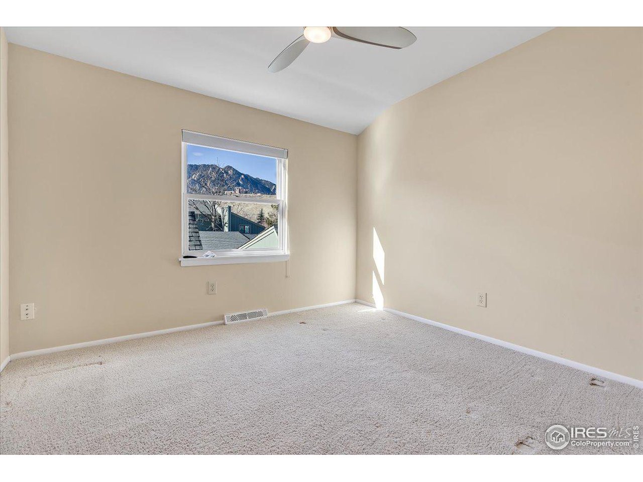 81 Benthaven Place Boulder, CO 80305 - Photo 24 of 32 a view of an empty room with a window