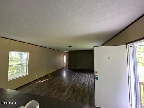 306 Dynatex Road Lancing, TN 37770 - Photo 3 of 13 a view of a livingroom with an empty space and a window