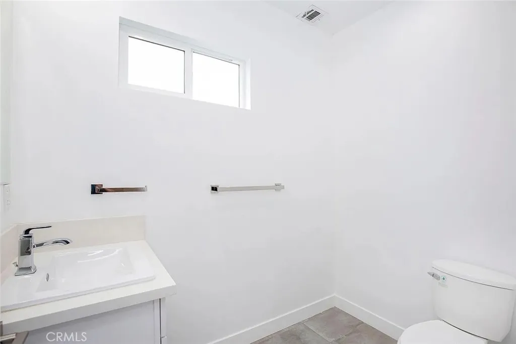 5024 Cleon Avenue North Hollywood, CA 91601 - Photo 20 of 22 a bathroom with a sink and a vanity