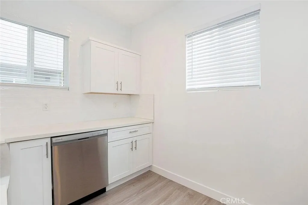 5024 Cleon Avenue North Hollywood, CA 91601 - Photo 6 of 22 a view of cabinets with wooden floor