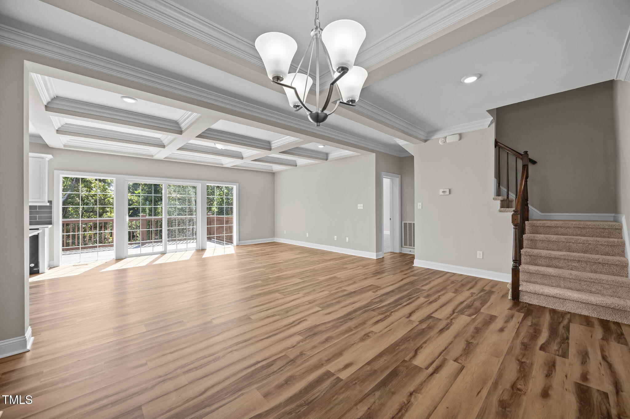 6117 David Moore Road Burlington, NC 27217 - Photo 13 of 51 a view of empty room with wooden floor and fan