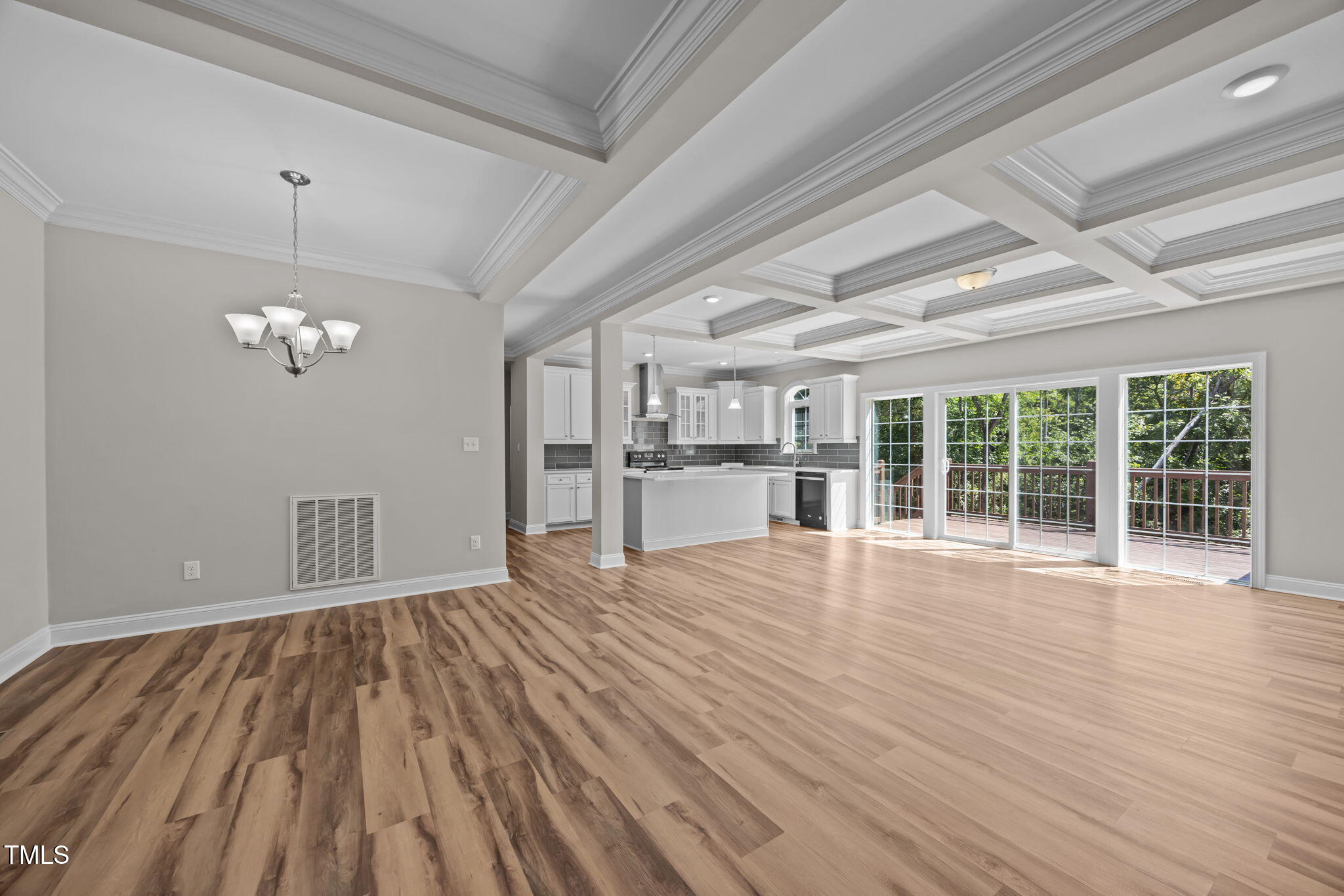 6117 David Moore Road Burlington, NC 27217 - Photo 15 of 51 a view of empty room with wooden floor and window