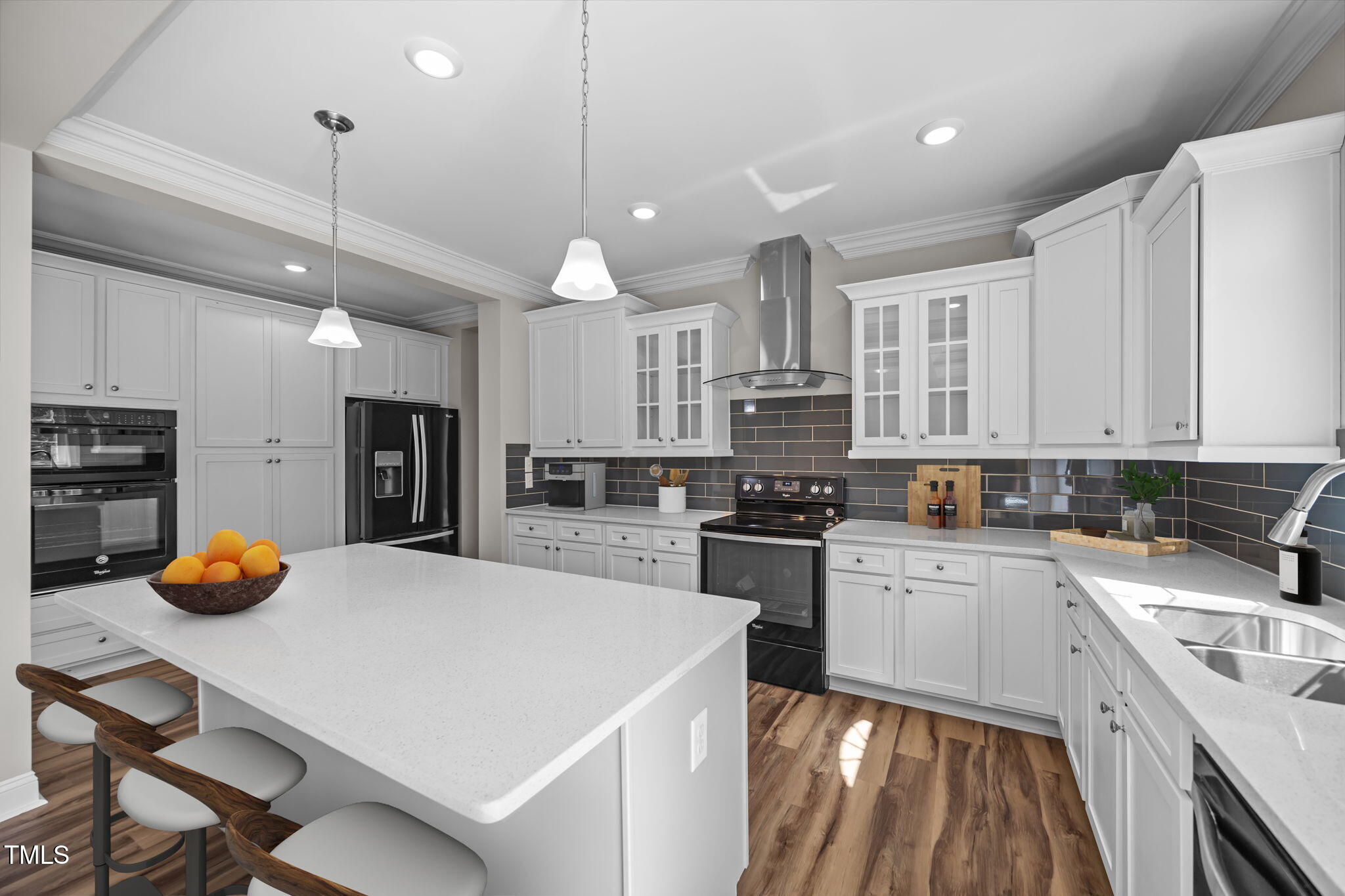 6117 David Moore Road Burlington, NC 27217 - Photo 20 of 51 a kitchen with a sink a counter space cabinets and stainless steel appliances