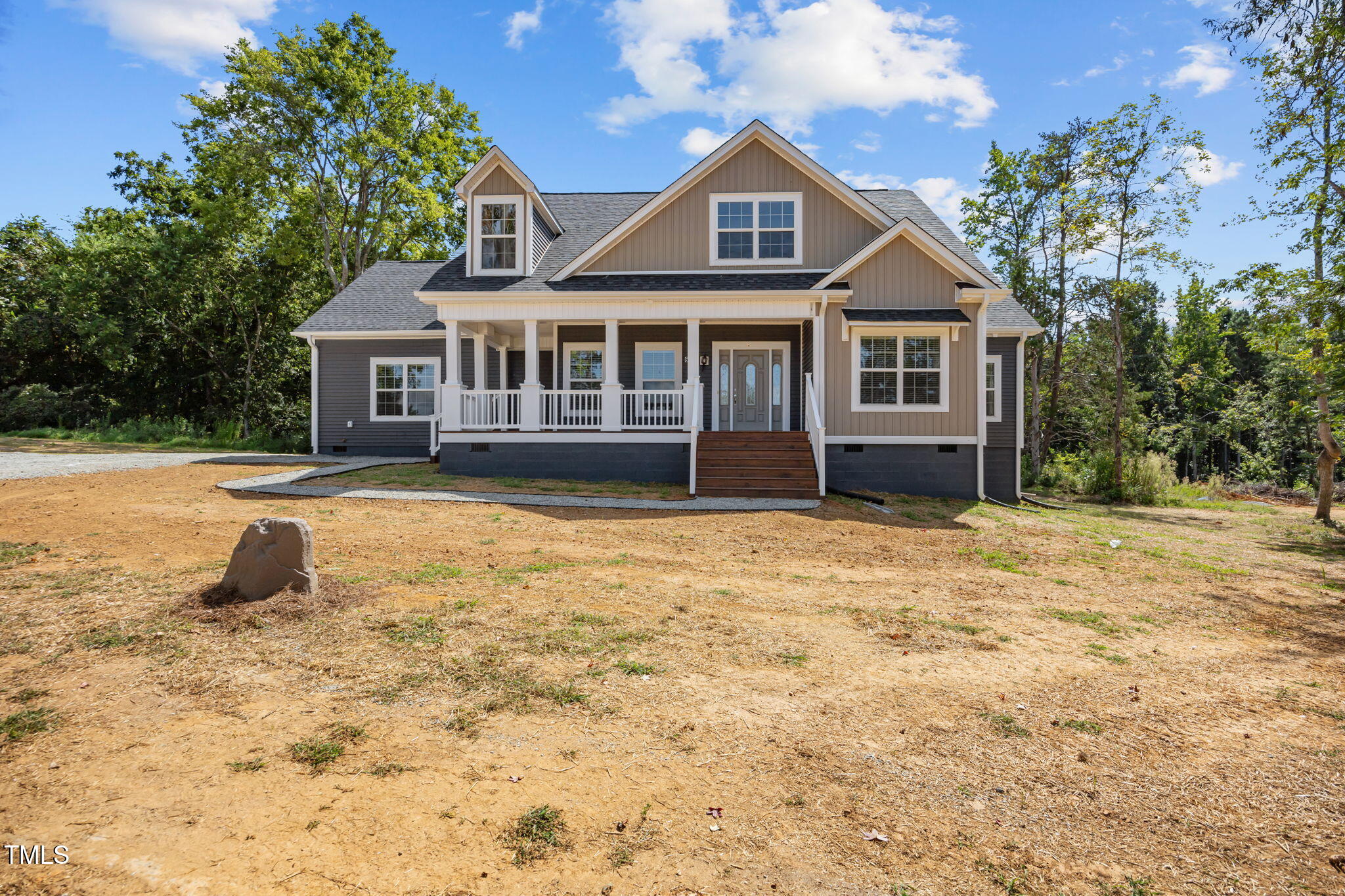 6117 David Moore Road Burlington, NC 27217 - Photo 2 of 51 a front view of a house with a yard
