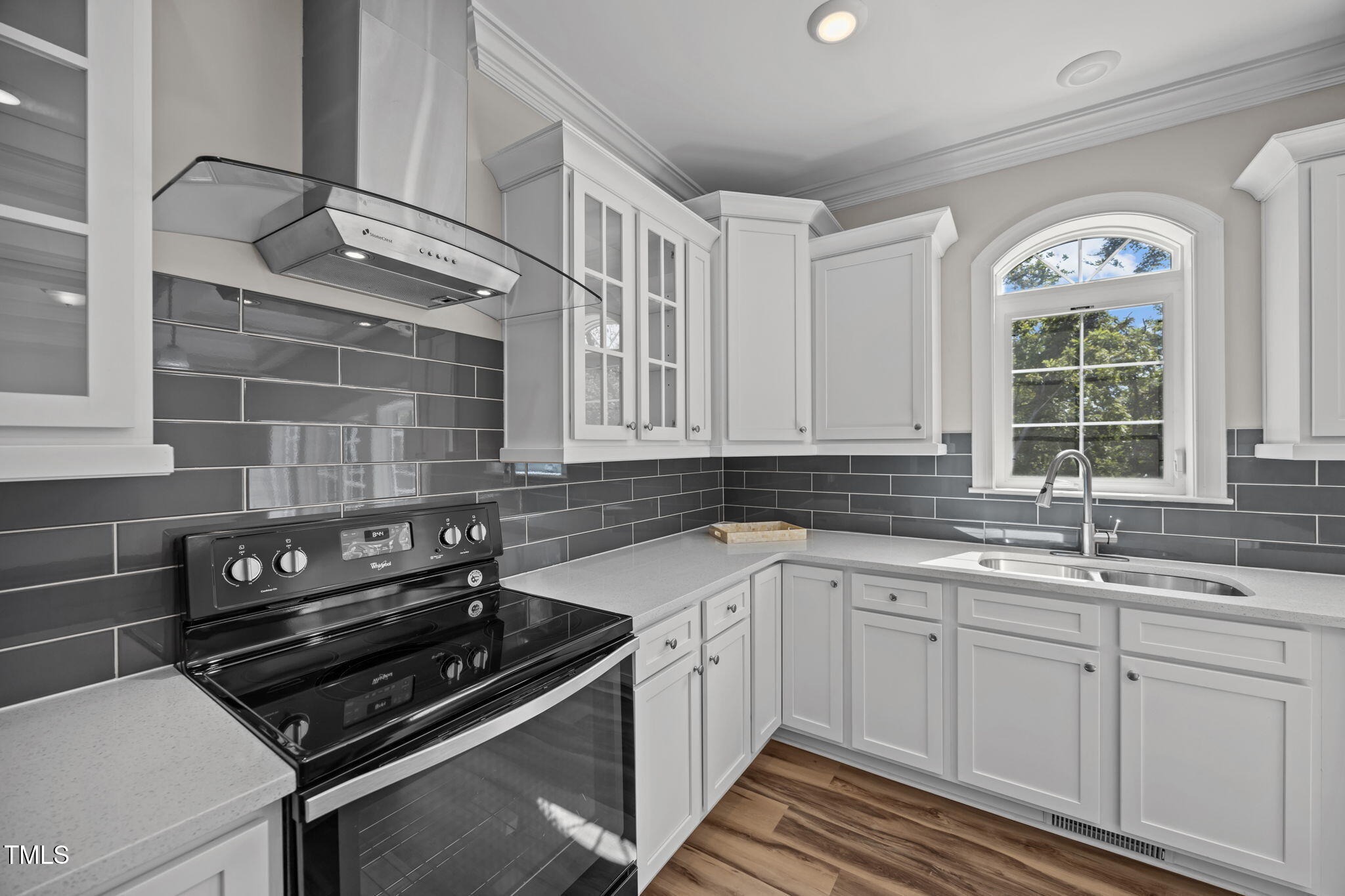 6117 David Moore Road Burlington, NC 27217 - Photo 22 of 51 a kitchen with a sink stove and cabinets