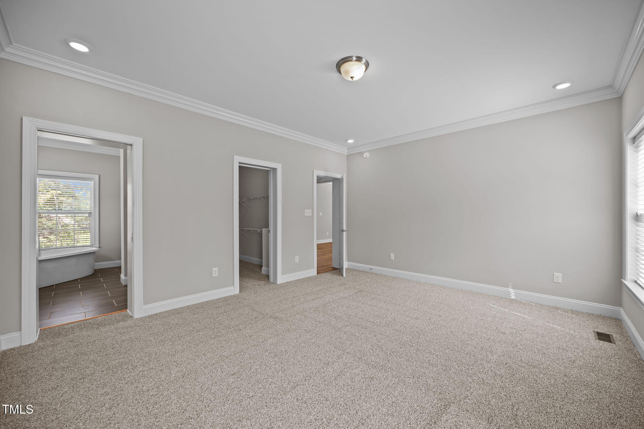 6117 David Moore Road Burlington, NC 27217 - Photo 24 of 51 an empty room with closet and a yard