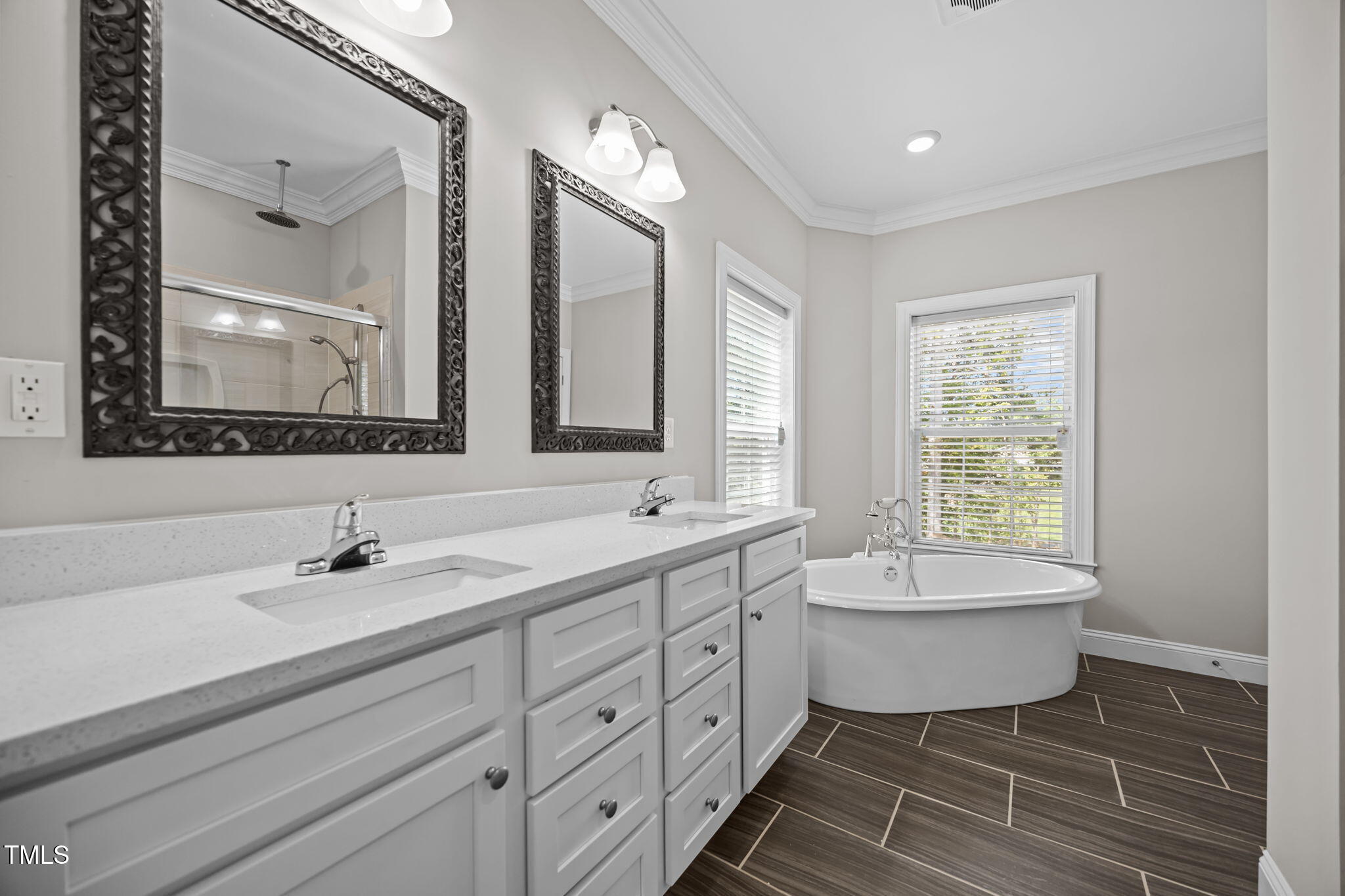 6117 David Moore Road Burlington, NC 27217 - Photo 26 of 51 a bathroom with a double vanity sink mirror and bathtub