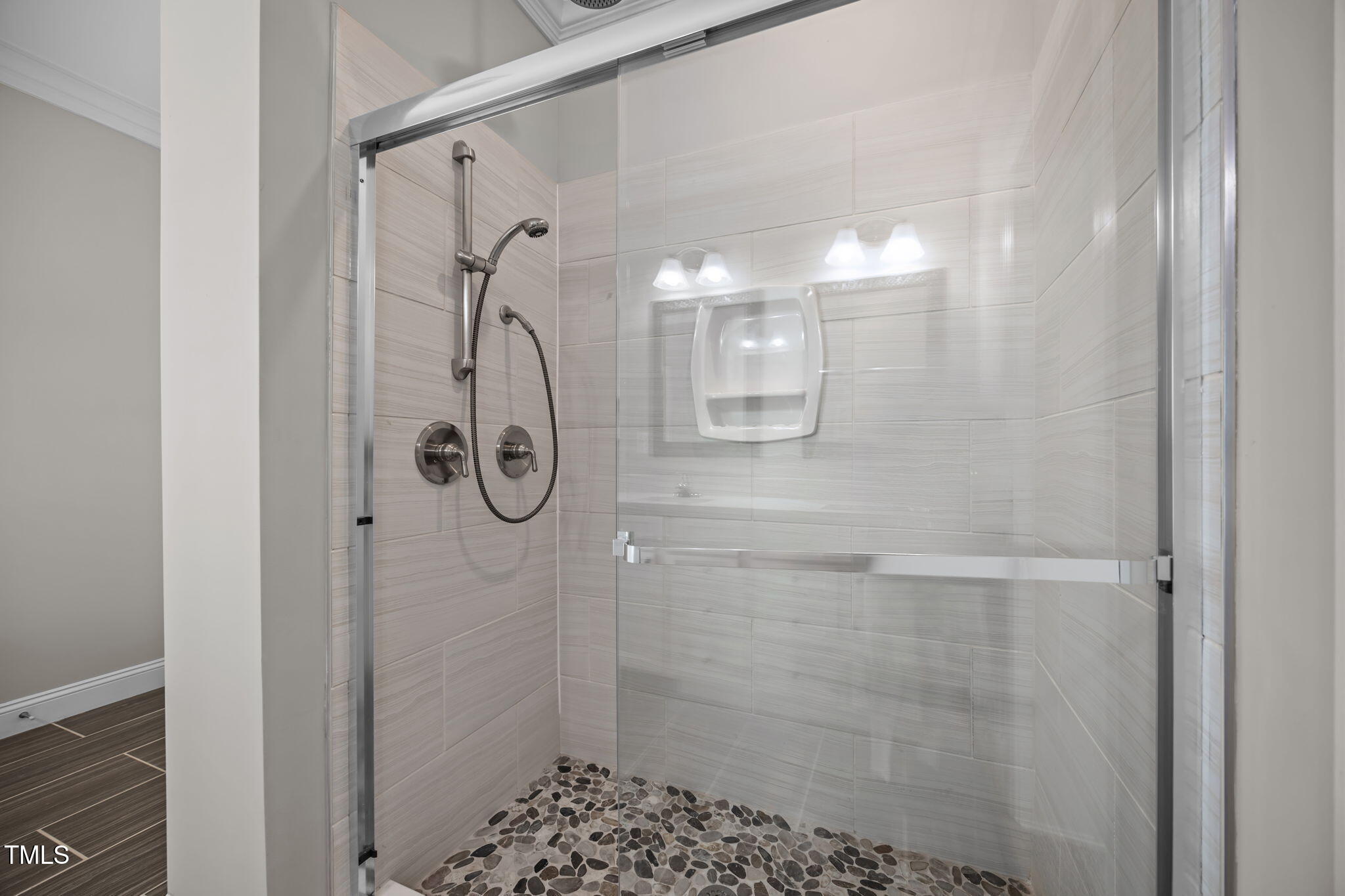 6117 David Moore Road Burlington, NC 27217 - Photo 27 of 51 a bathroom with a glass shower door